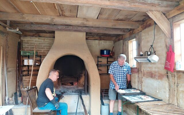 Unsere Heizer beim Pizza backen